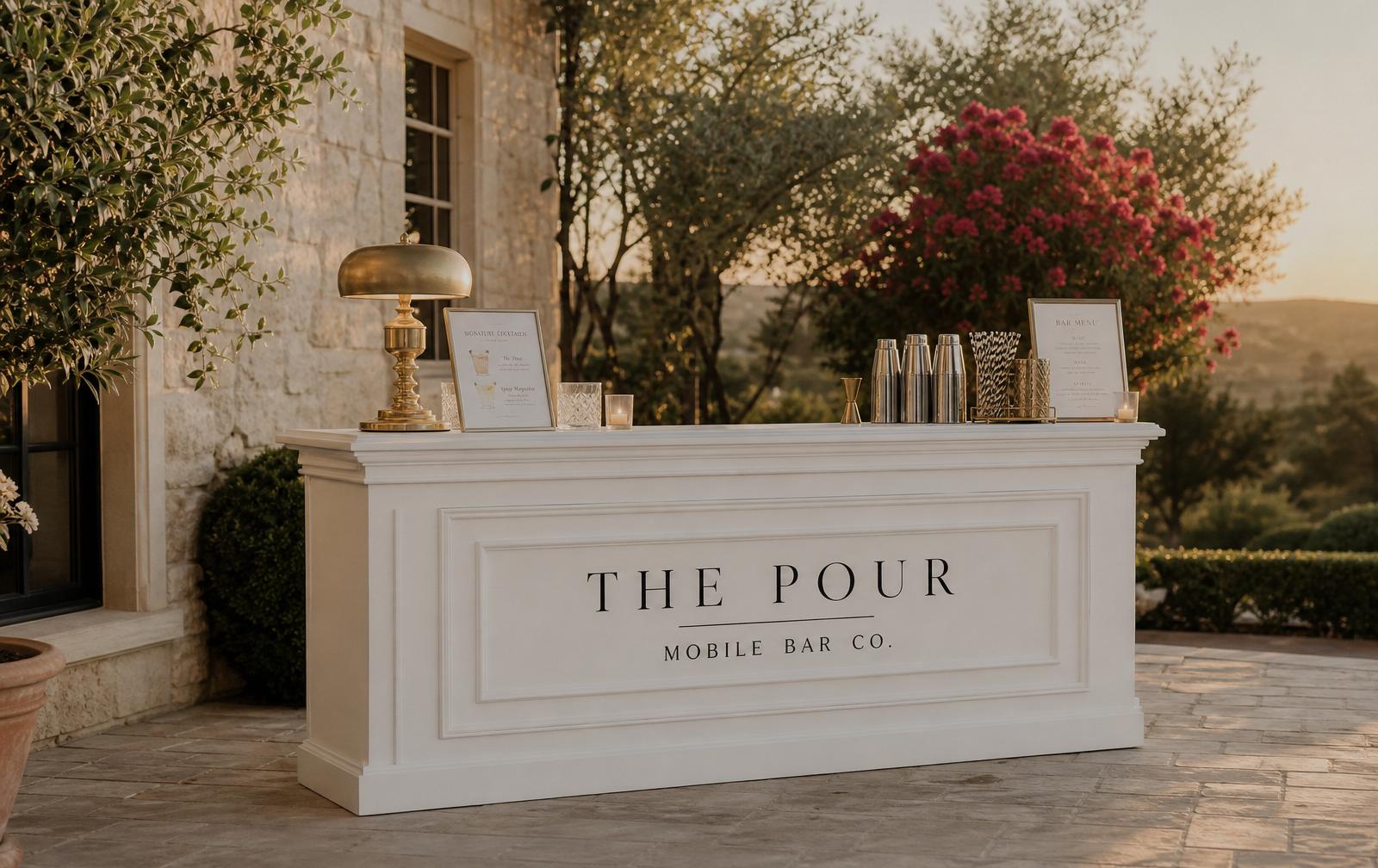 White linen mobile bar cart at a Long Island wedding
